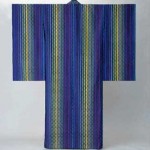 2003 絹紫地経浮花倉織着物